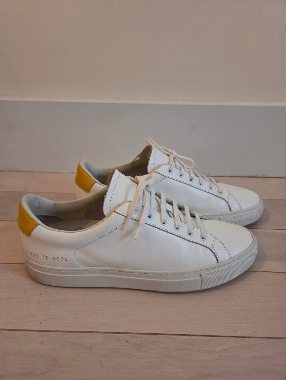 Common Projects White Leather Low-Tops with Yellow Heel Patch